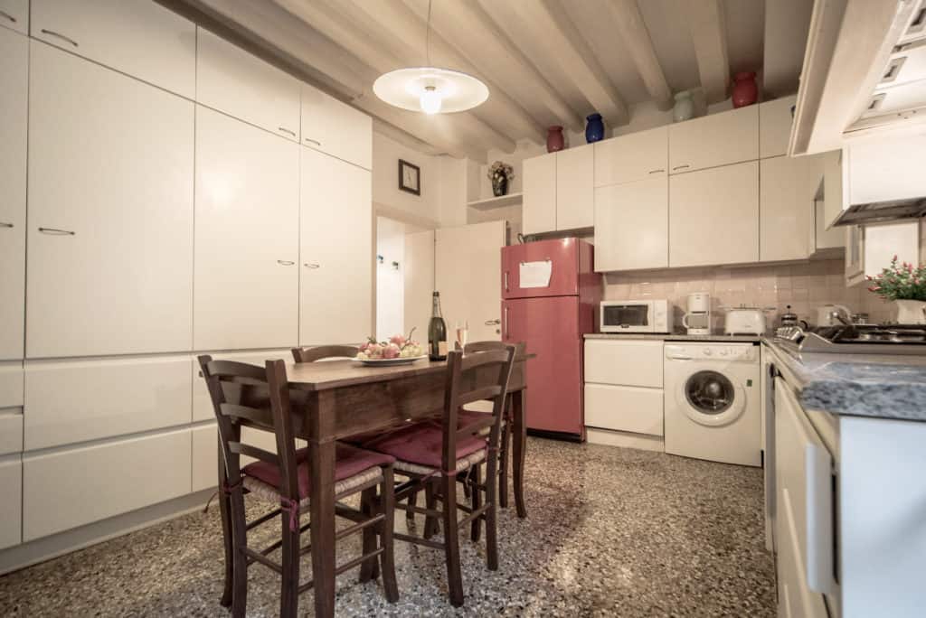 Left side of spacious kitchen with dining table - Accademia Terrazza Apartment Left side of spacious kitchen with dining table - Accademia Terrazza Apartment