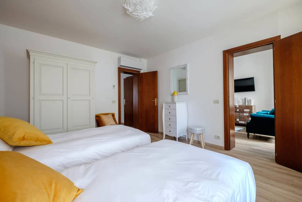 Left side of large twin bedroom - Ai Turchesi Apartment Left side of large twin bedroom - Ai Turchesi Apartment