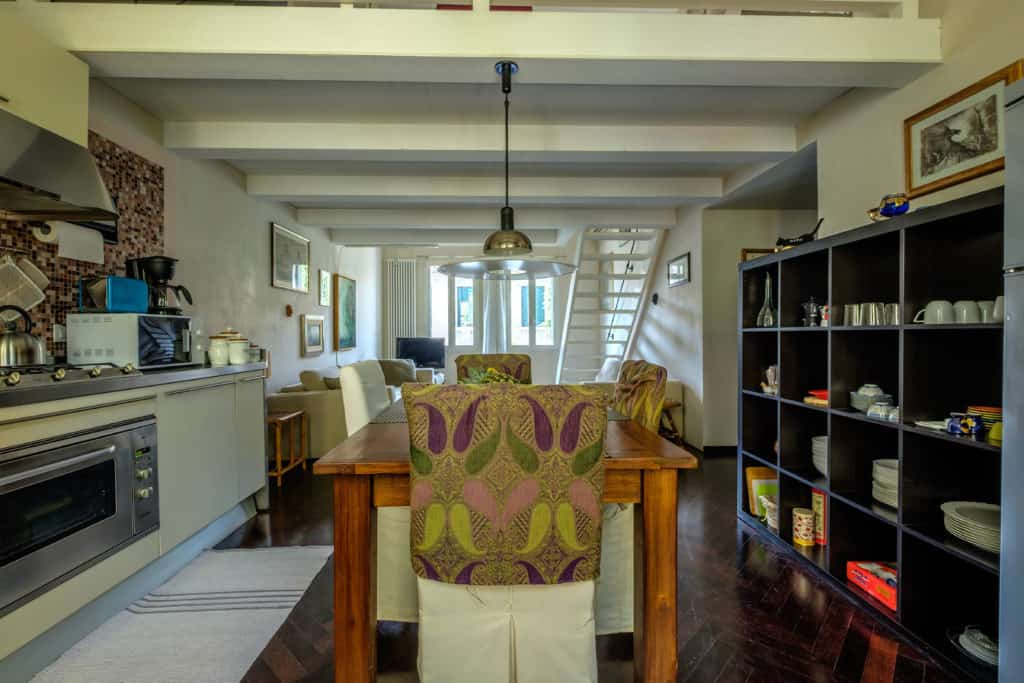 Large open space kitchen and dining area - Attico Terrace Apartment Large open space kitchen and dining area - Attico Terrace Apartment