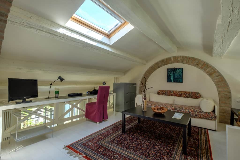 Left side of the attic with additional small living area - Attico Terrace Apartment Left side of the attic with additional small living area - Attico Terrace Apartment