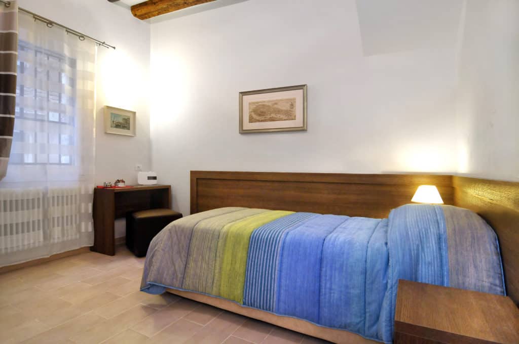 Left view of the small single bedroom - Ca' Dorina Apartment Left view of the small single bedroom - Ca' Dorina Apartment