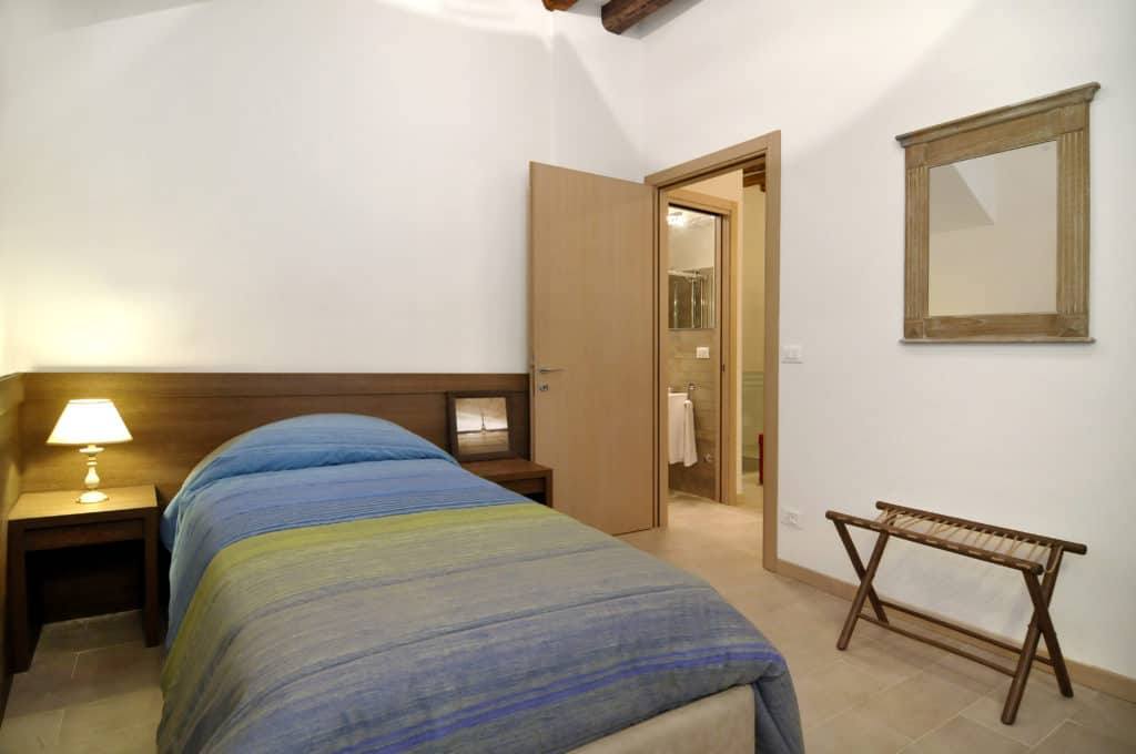 RIght view of the small single bedroom - Ca' Dorina Apartment RIght view of the small single bedroom - Ca' Dorina Apartment