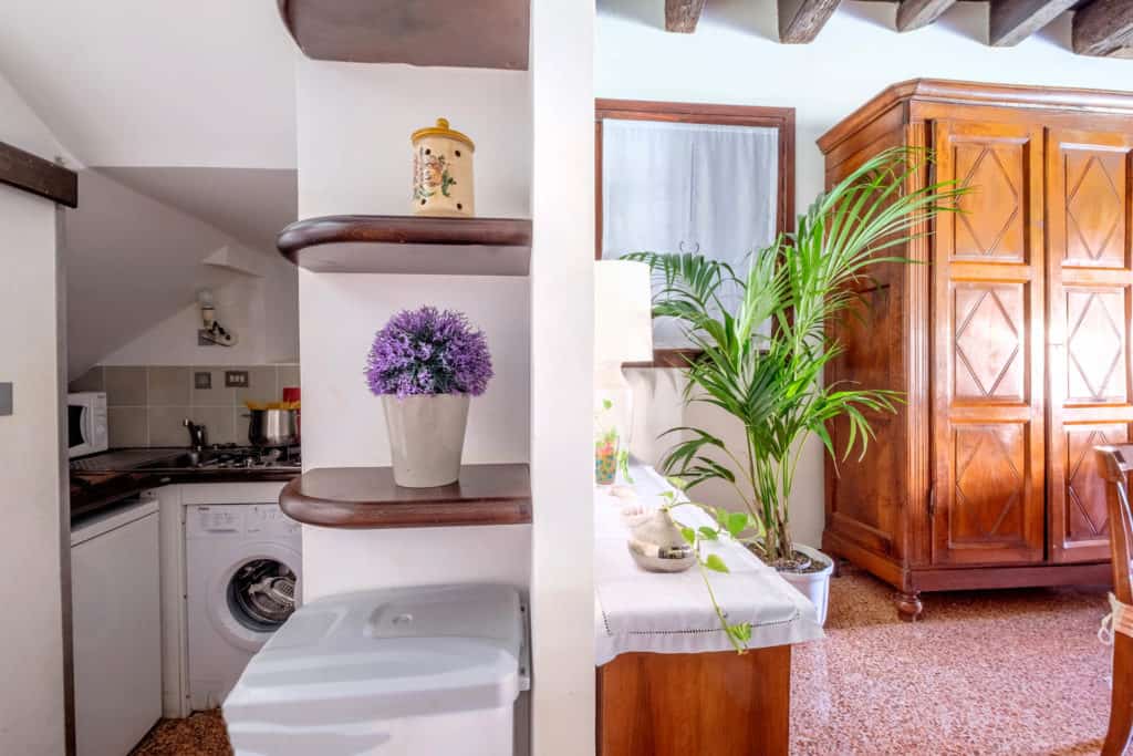 Small kitchen and view on the living room - Ca' Mocenigo Apartment Small kitchen and view on the living room - Ca' Mocenigo Apartment