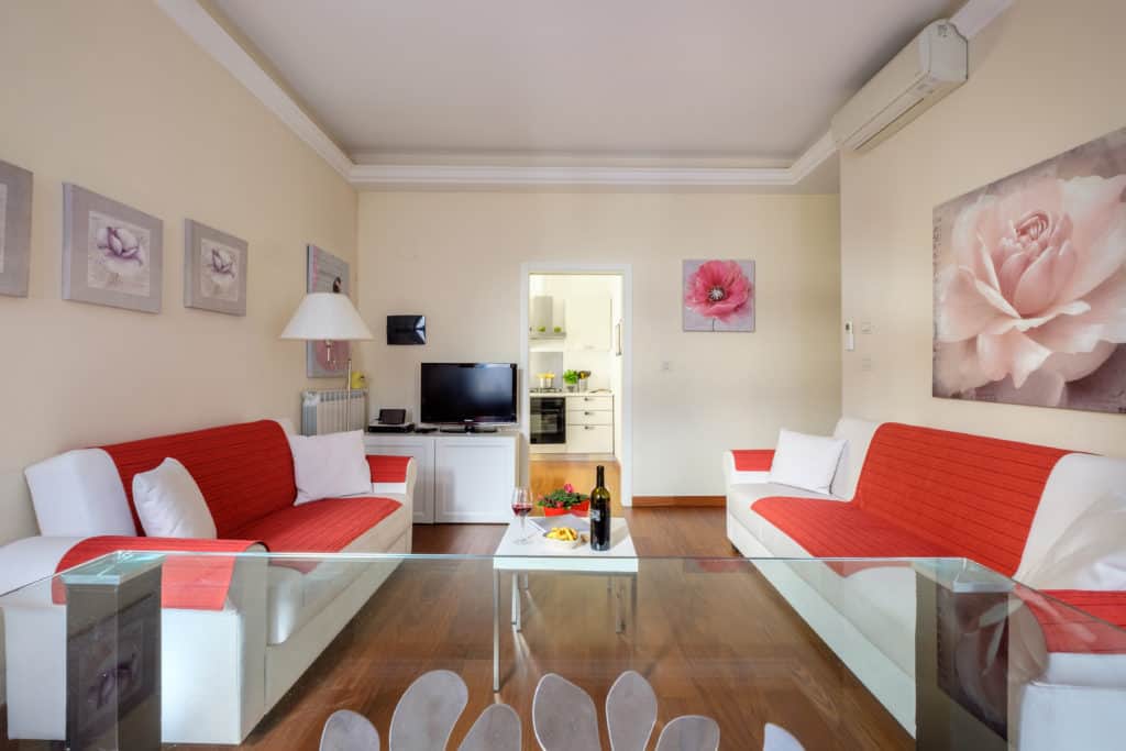Entrance of the luminous living room with two sofas - Ca' Rialtina Apartment Entrance of the luminous living room with two sofas - Ca' Rialtina Apartment
