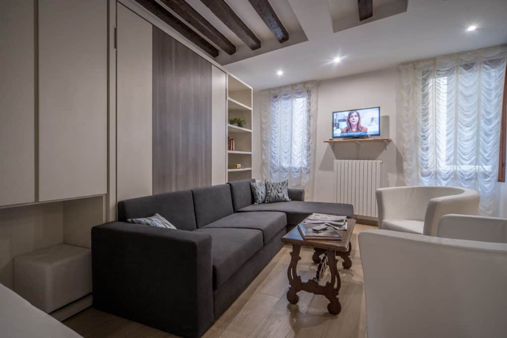 Small living room with modern furnishing - Ca' Alba Apartment Small living room with modern furnishing - Ca' Alba Apartment