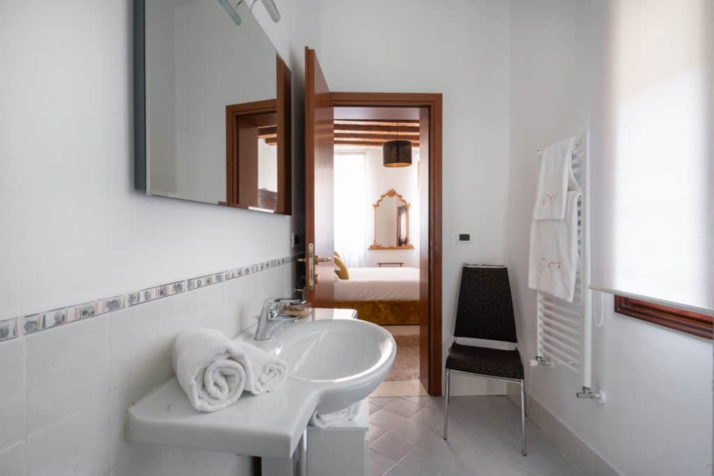 Entrance door of the large bathroom - Casa Graziosa Apartment Entrance door of the large bathroom - Casa Graziosa Apartment