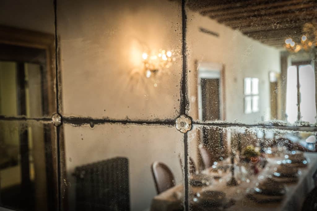Detail of the vintage mirror - Palazzina Canal Apartment Detail of the vintage mirror - Palazzina Canal Apartment