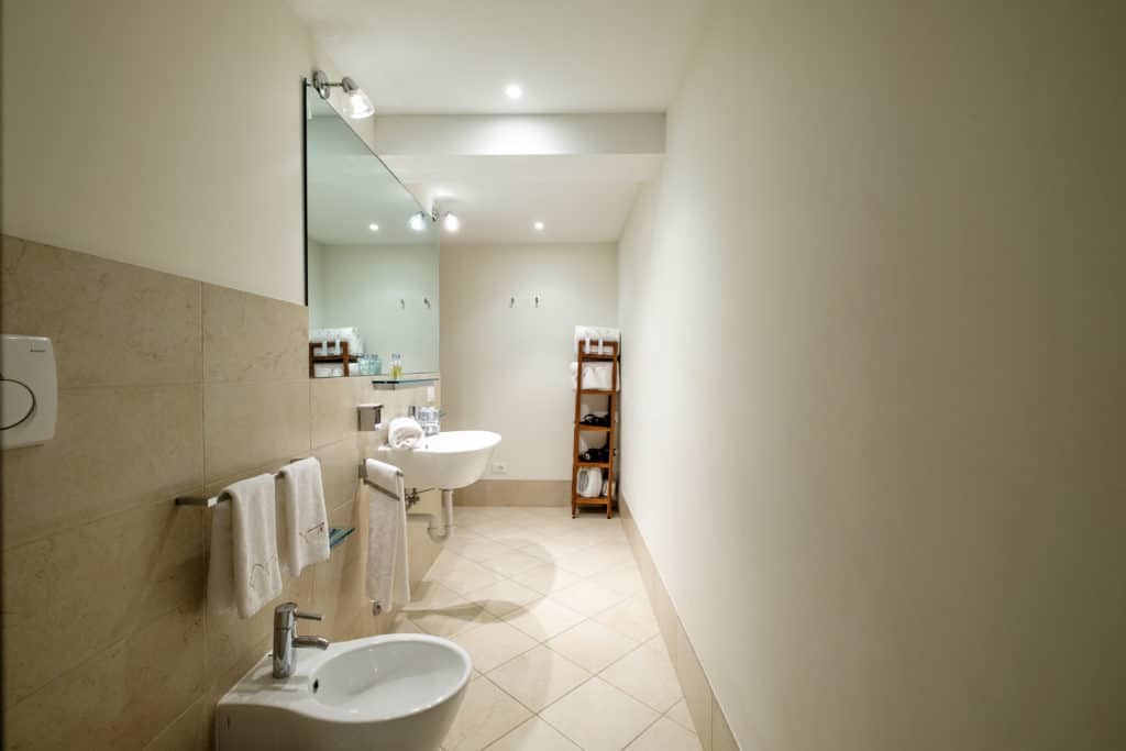Entrance of the bathroom and moden furnishing - The Lion's 1 Apartment Entrance of the bathroom and moden furnishing - The Lion's 1 Apartment