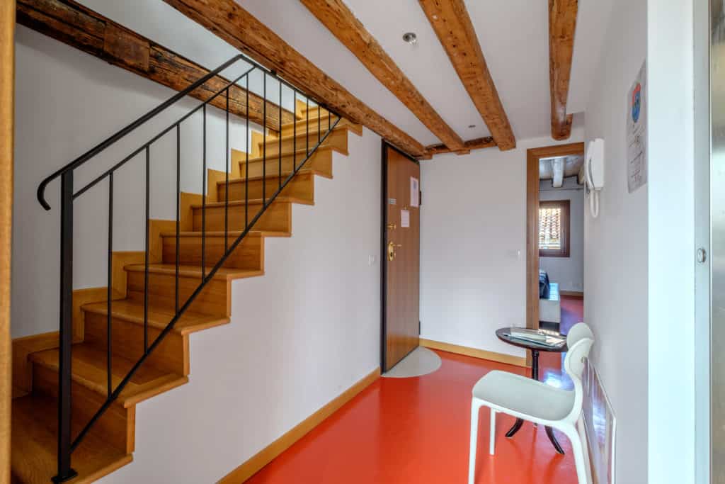 Hallway with stairs - The Lion's 4 Apartment Hallway with stairs - The Lion's 4 Apartment