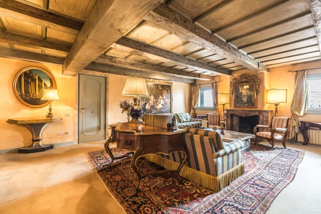 Left view of the luminous living room with antique Venetian furnishing - The Venetian Penthouse Apartment Left view of the luminous living room with antique Venetian furnishing - The Venetian Penthouse Apartment