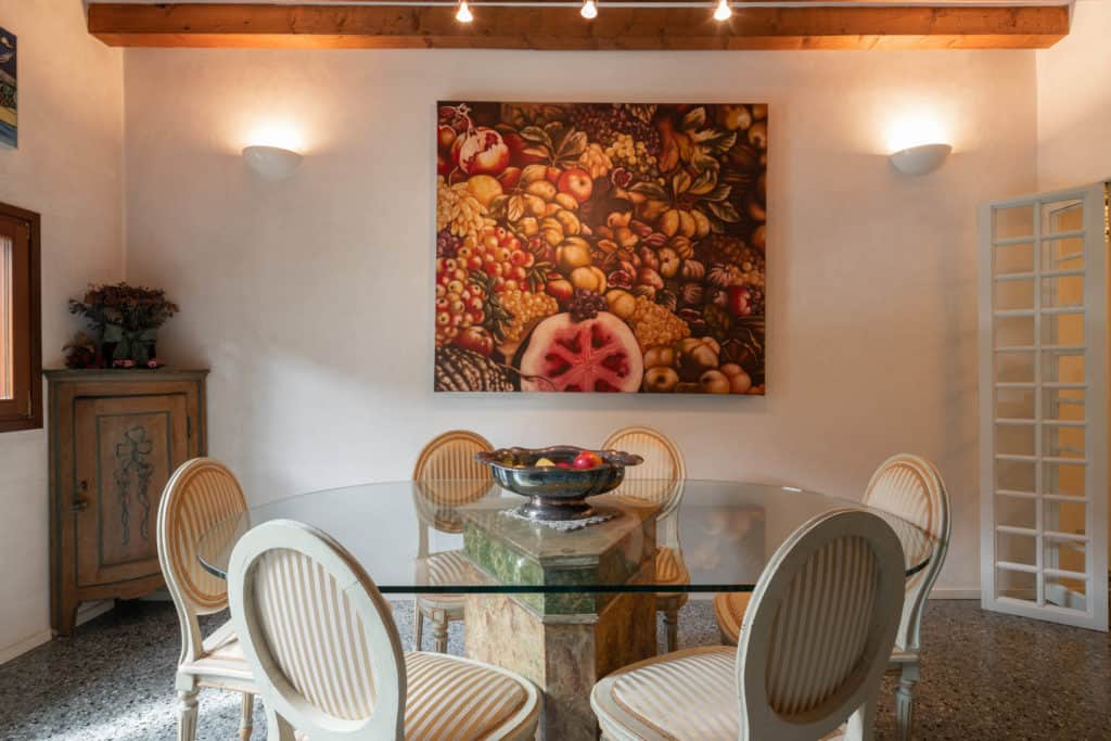 RIght view of the living space with dining table - Garden Apartm