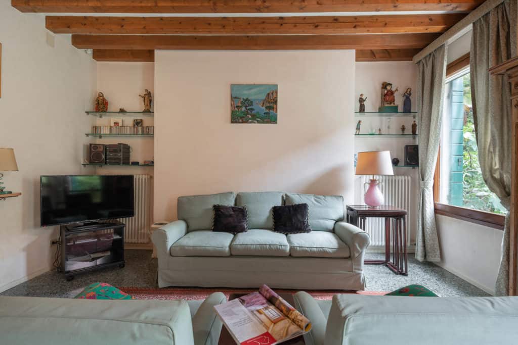 Sofas detail in the living room with vintage furnishing and expo