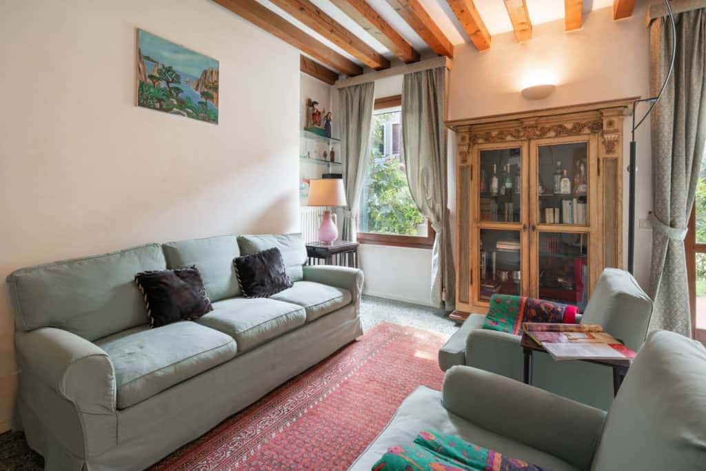 Right view of the sofas detail in the living room with vintage f